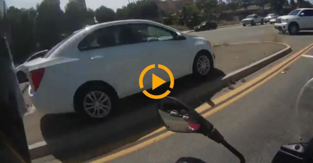 Car Barely Misses Motorcycle