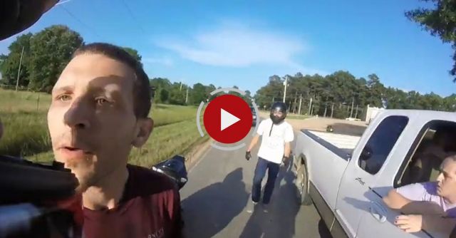 Road Rage Between Motorcyclist And Truck Driver