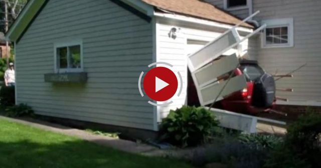 Old Man Backs Out Of His Garage With Door Closed