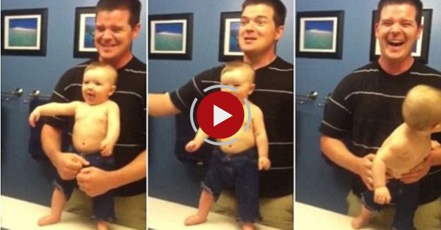 Baby Adorably Flexes Muscles With Dad