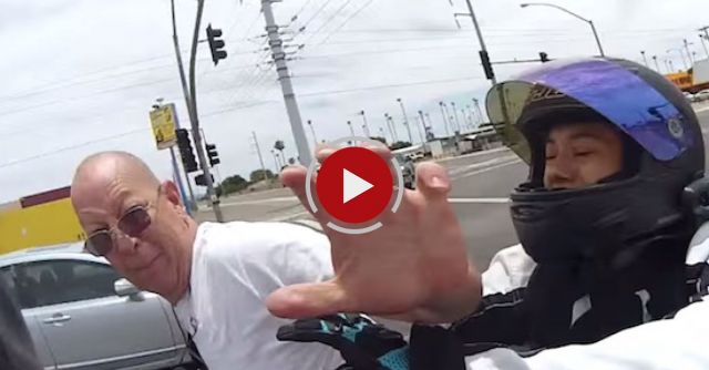 Road Rage Against Motoryclist Turns Physical