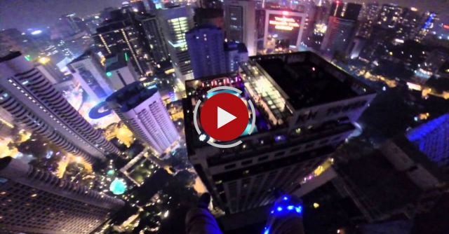 Base Jumper Lands In Rooftop Pool