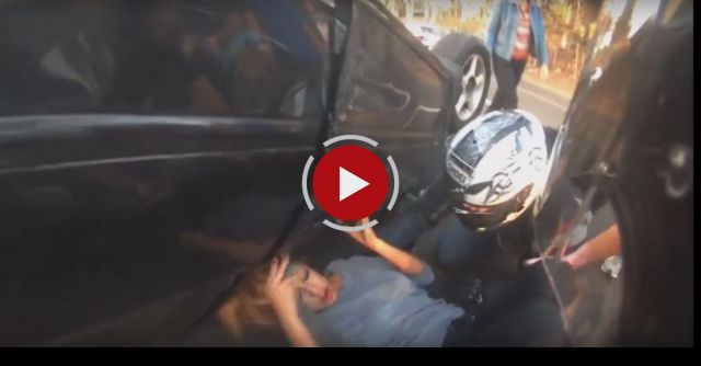  Motorcyclist Rescues Girl From Car 