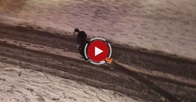 Drunken Russian Taking Their Buddy Home After Apres Ski