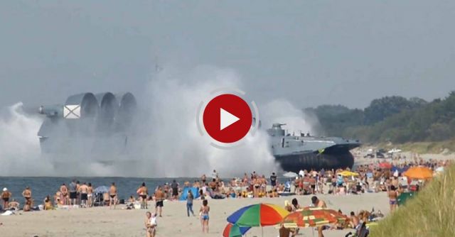 Russian Navy Hovercraft Lands On Busy Beach