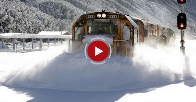 Spectacular Footage Train Plowing Through Deep Snow  Arthurs Pass