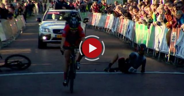 Spectator Grabs Cyclist During Bike Race Near The Finish Line