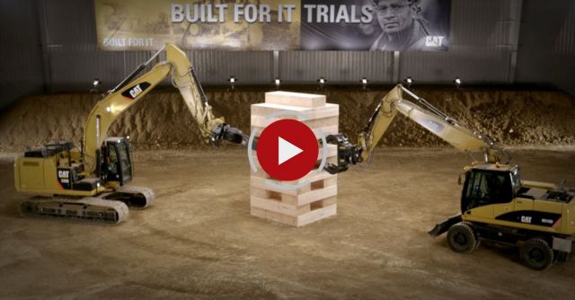 Playing Giant Game Of Jenga With Heavy Machinery