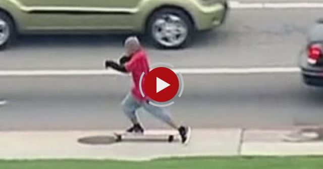 Man Tries To Flee From A Car Chase On A Longboard