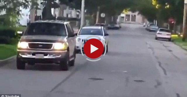 Woman Drives On Sidewalk To Avoid Stopping School Bus