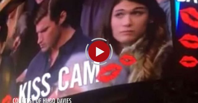 Woman Kisses Man Next To Her On Kiss Cam After Date Snubs Her