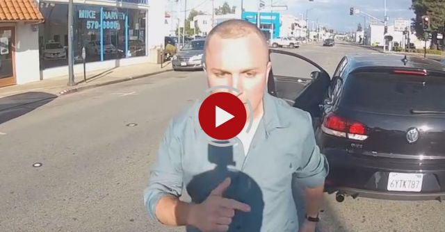 Crazy Guy Hits Motorcyclist Road Rage