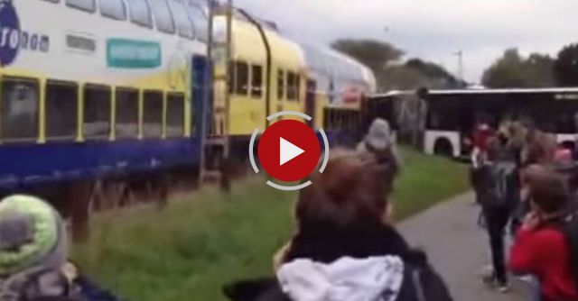 Train Ploughs Into Evacuated School Bus