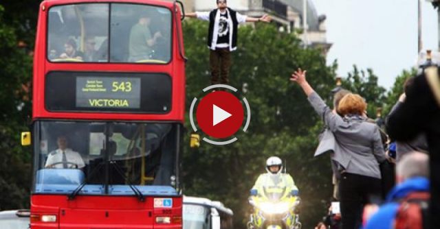 Magician Dynamo Levitates Alongside A Double-decker Bus