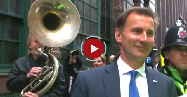 Following Jeremy Hunt With A Sousaphone - Again! 