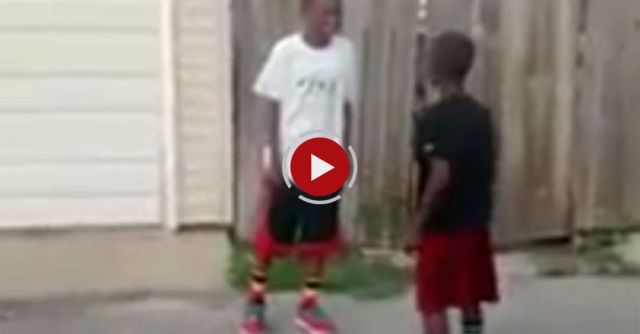 Kid Punches Boy While Ghost Riding Bike