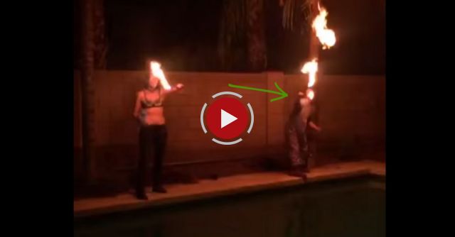 Fire Blower Lights Face On Fire
