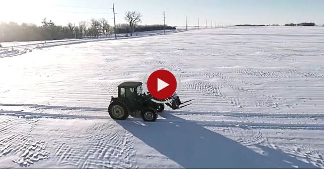 Farmer Creates Amazing Snow Art With Tractor & Drone