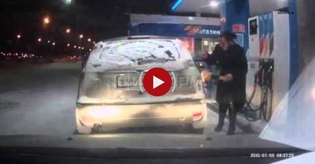  Warming Hands While Pumping Gas 