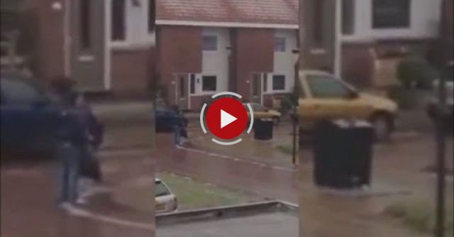 Guy Cant Put Away His Garbage Because Of The Ice Layered Streets