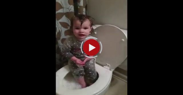 Baby Takes A Bath In The Toilet
