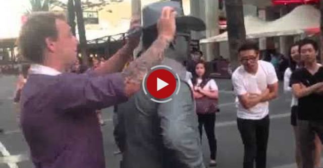 Guy Gets Punched By Street Performer! 