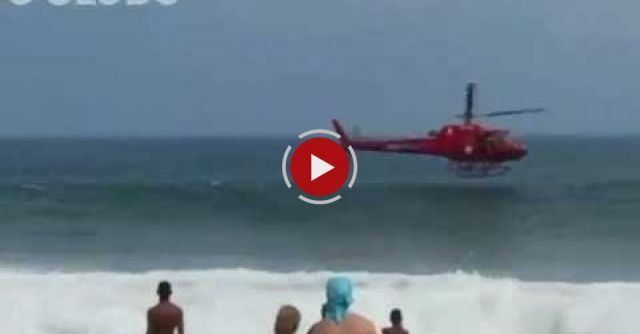 Helicopter Crashes Into Rio De Janeiro Beach While Attempting To Save Swimmer