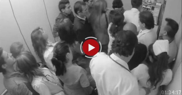 A Doctor Gropes A Nurse While On A Crowded Elevator