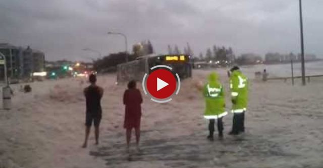 Police Are Nearly Hit By Speeding Car Hidden By Sea Foam