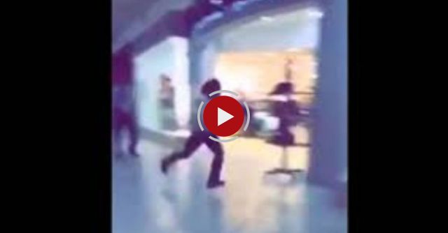 Woman Stops A Man Running From Mall Security.