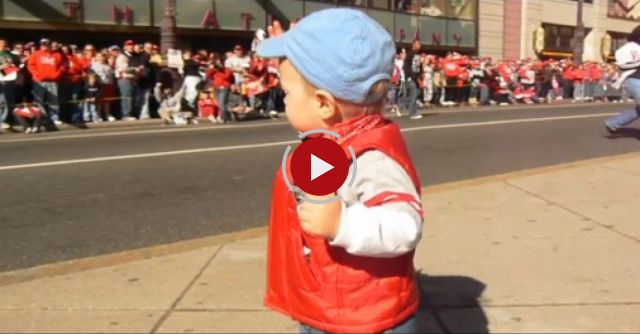 Toddler Leads The Celebration