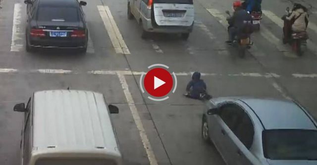 Child Escapes Death After Falling Out Of Moving Vehicle, Being Run Over By Car