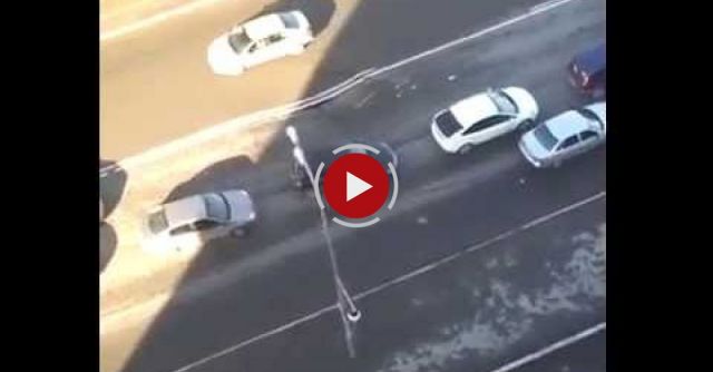 A Sinkhole On The Road Happening In Real Time As Cars Pass