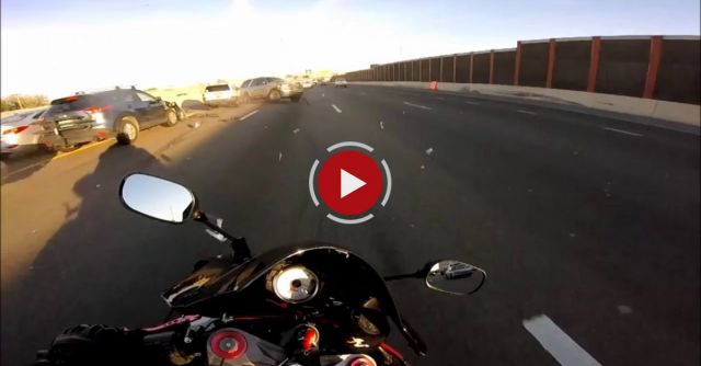 Motorcycle Dodges Wreck On Freeway