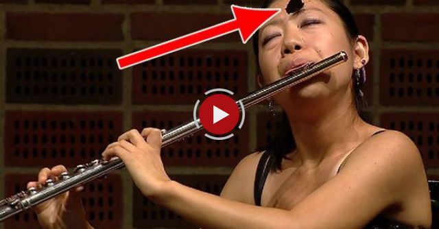 Butterfly Fails To Faze Flautist