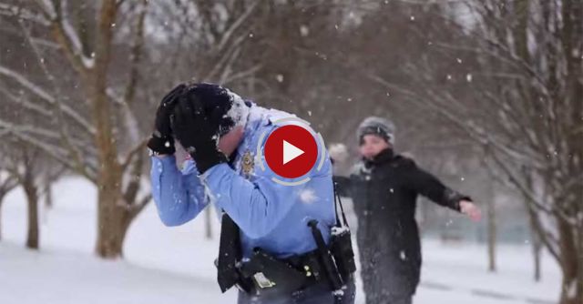 Raleigh Police Officers Join In On A Snowball Fight And Sledding At Lions Park