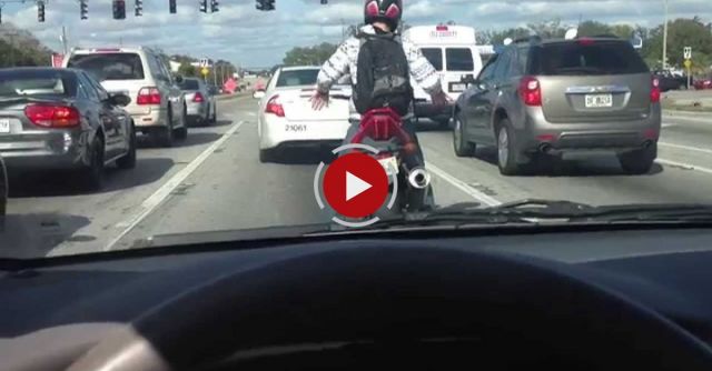 WORLDS BEST Motorcycle Popping Locking And Dropping It, At A Stop Light