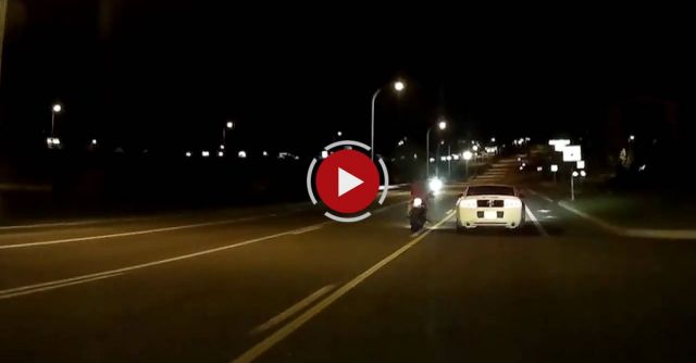 Mustang Knocks Dude Off Motorcycle 
