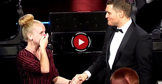 Fan Sings With Michael Buble At XL Center