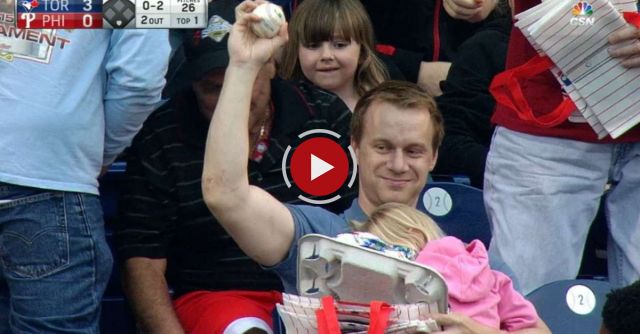 Fan Grabs Foul Ball While Holding His Child