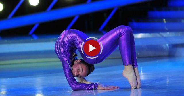 This girl has no bones! Your back will hurt just from watching this.