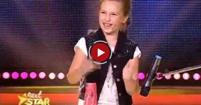 She walks out on stage with a single cup. Within seconds she wins over the judges and me!