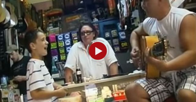 White kid sings the blues in guitar shop like it's nobody's business!