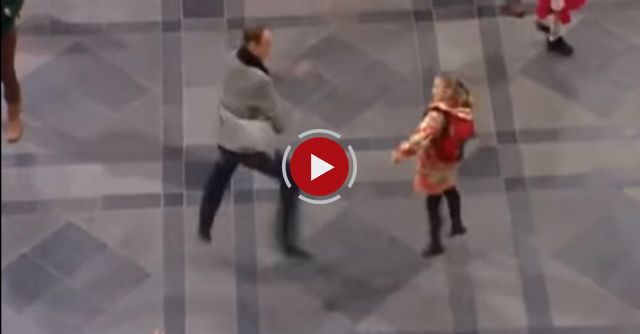 A father and daughter start to dance and the travellers at this Belgian train station get the best s