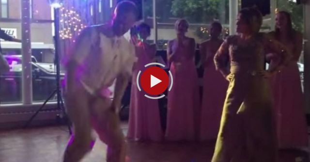 The music starts: this dance-off between the groom and his mother is overwhelming!