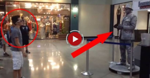 A child vs the street artist: a dubstep dance battle at the shopping center