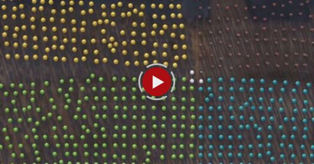 Give umbrellas to hundreds of people with good timing and here's what happens.