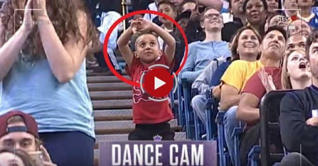 They're at an NBA game. When the dance cam catches them? It's time to bust a move!